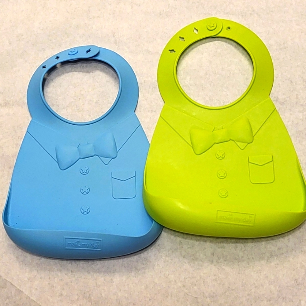 Two "Make My Day" silicone baby bibs